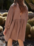 Textured Babydoll Mini Dress with Back Keyhole Detail DJPT
